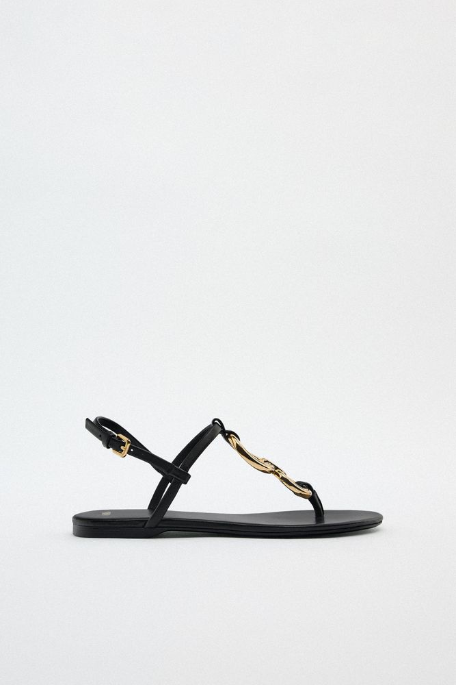 FLAT LEATHER SANDALS WITH DECORATIVE DETAIL
