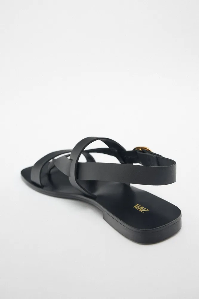 FLAT LEATHER SANDALS