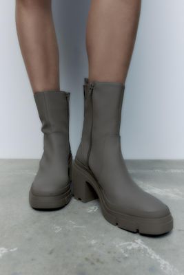 RUBBERIZED HEELED ANKLE BOOTS