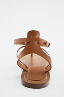 FLAT LEATHER SANDAL WITH BUCKLE