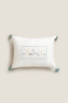 EMBROIDERED THROW PILLOW WITH TASSELS