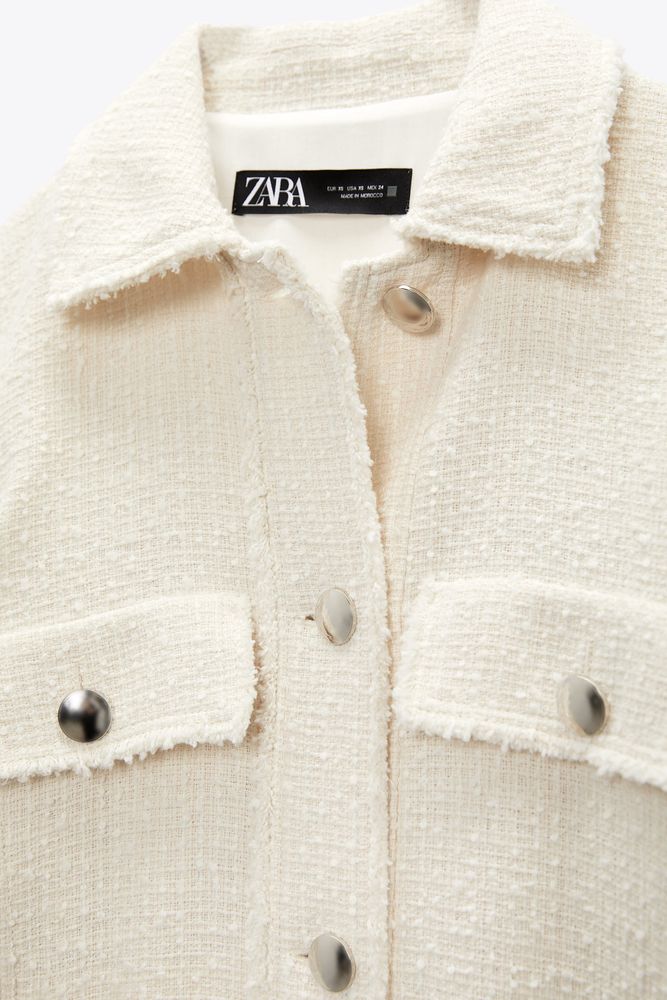 STRUCTURED JACKET WITH FRAYED EDGES