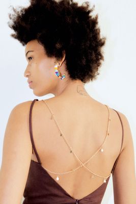 DRAPED DRESS WITH JEWEL CHAIN AT BACK