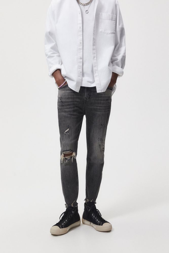 TAPERED SKINNY JEANS