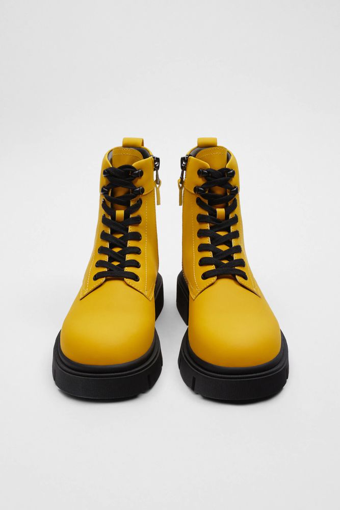 RUBBERIZED LACE UP BOOTS
