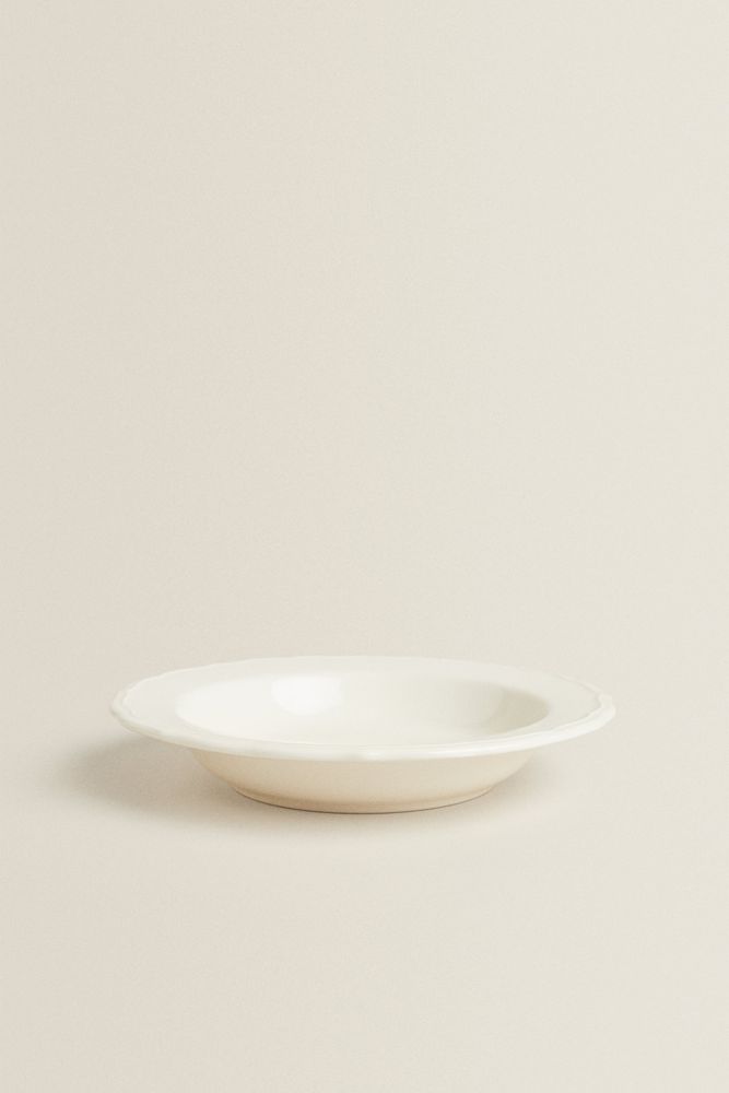 EARTHENWARE SOUP PLATE WITH A RAISED-DESIGN EDGE