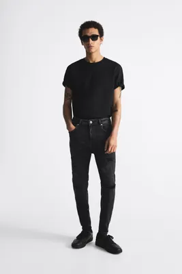 RIPPED SKINNY JEANS