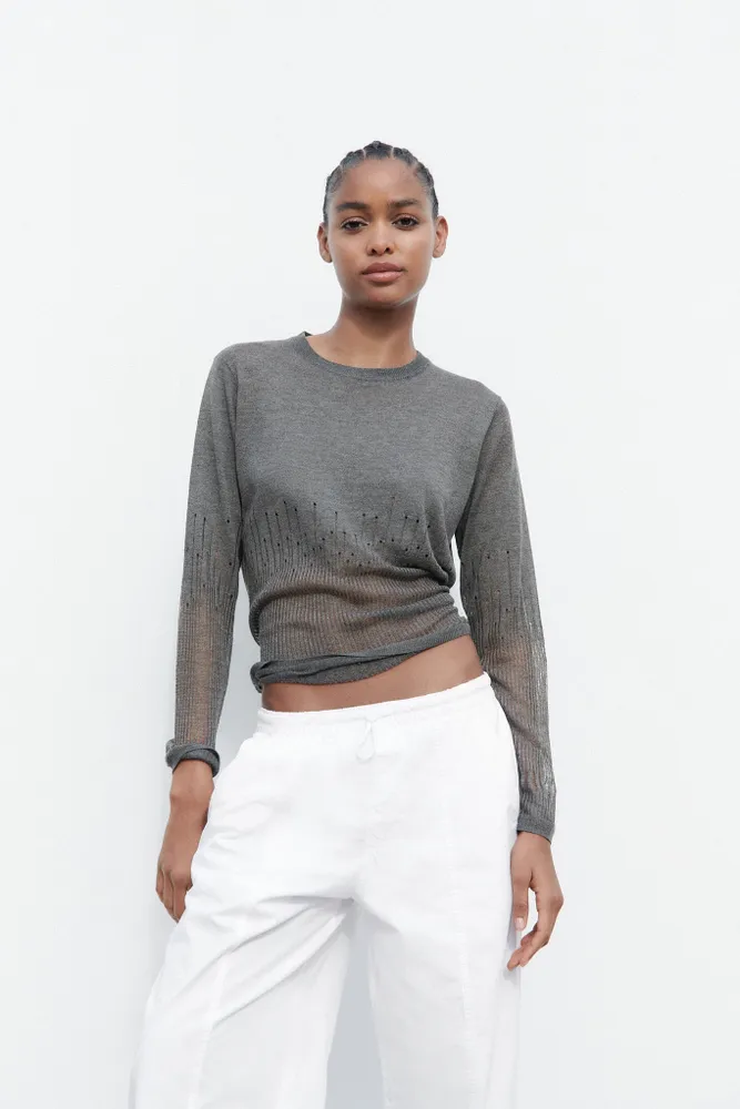 KNIT SWEATER WITH RIPS