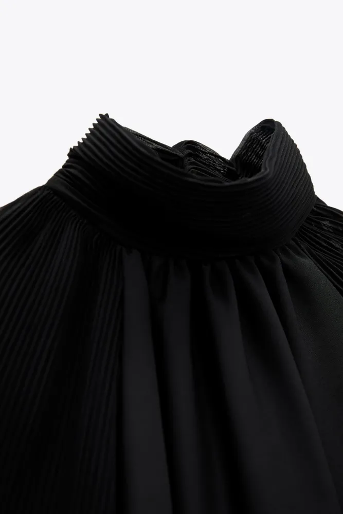 COMBINATION PLEATED BLOUSE