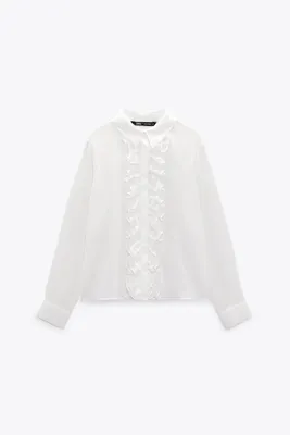 CHEMISE SEMI-TRANSPARENTE À VOLANTS