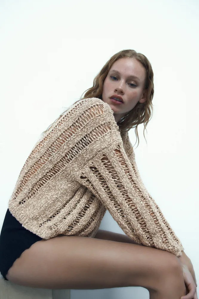 COMBINATION KNIT SWEATER