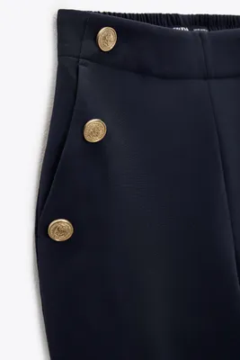 STRAIGHT LEG PANTS WITH METALLIC BUTTONS