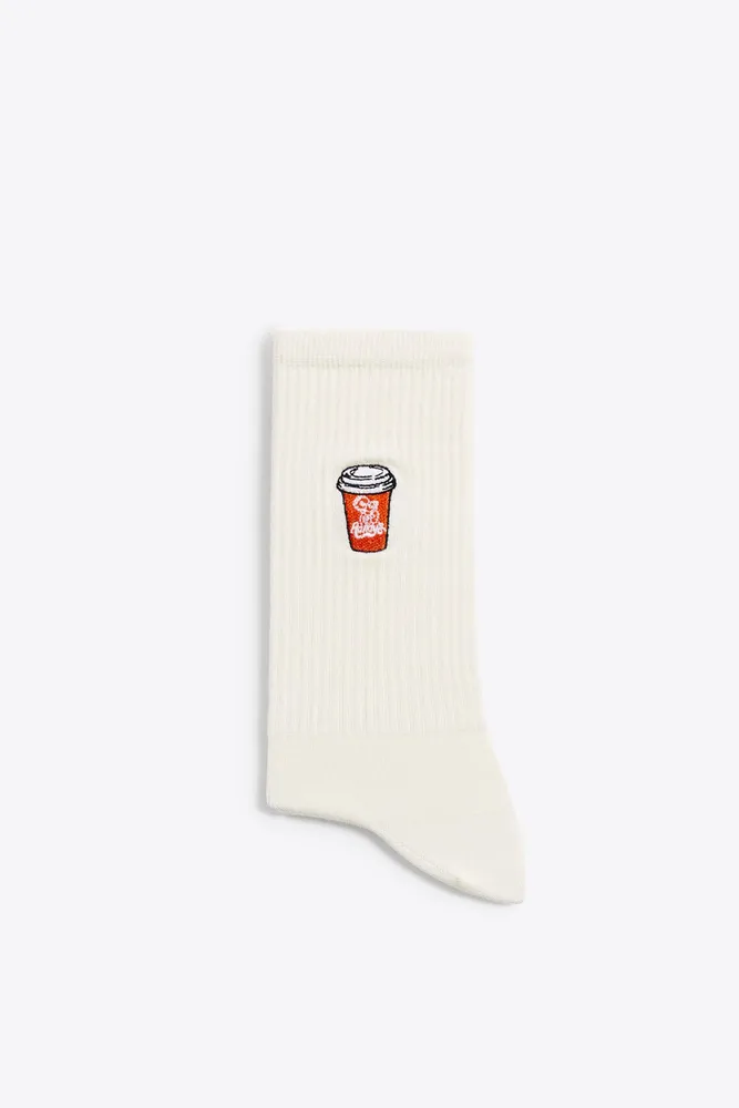 CHAUSSETTES À BRODERIE TASSE