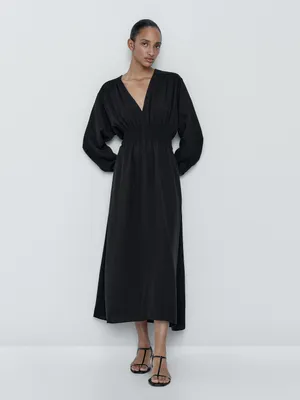Flowing dress with gathered detail