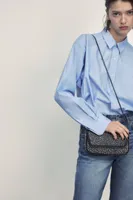 SAC BANDOULIÈRE STYLE ROCK À CLOUS