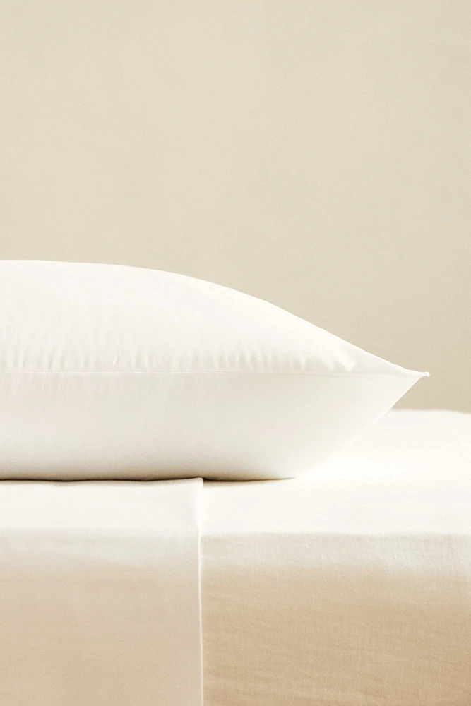 OREILLER EN MICROFIBRE