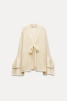 RUFFLED SLEEVE KNIT CARDIGAN