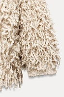 FRINGED KNIT SWEATER