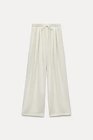 FLOWY PLEATED PANTS