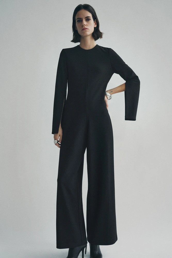 CREPE JUMPSUIT WITH SLITS