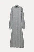 Midi turtleneck dress with long sleeves. A-line silhouette.