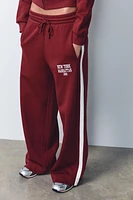 SIDE STRIPE TEXT PLUSH PANTS