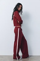 SIDE STRIPE TEXT PLUSH PANTS