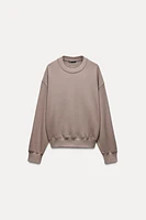 CROPPED LABEL SWEATSHIRT