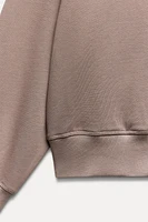 CROPPED LABEL SWEATSHIRT