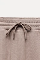 PLUSH PANTS WITH LABEL