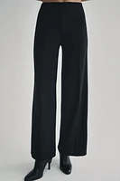 Wide leg pants with a high waist. Hidden zip closure at side.