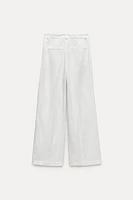 FLOWY PLEATED PANTS