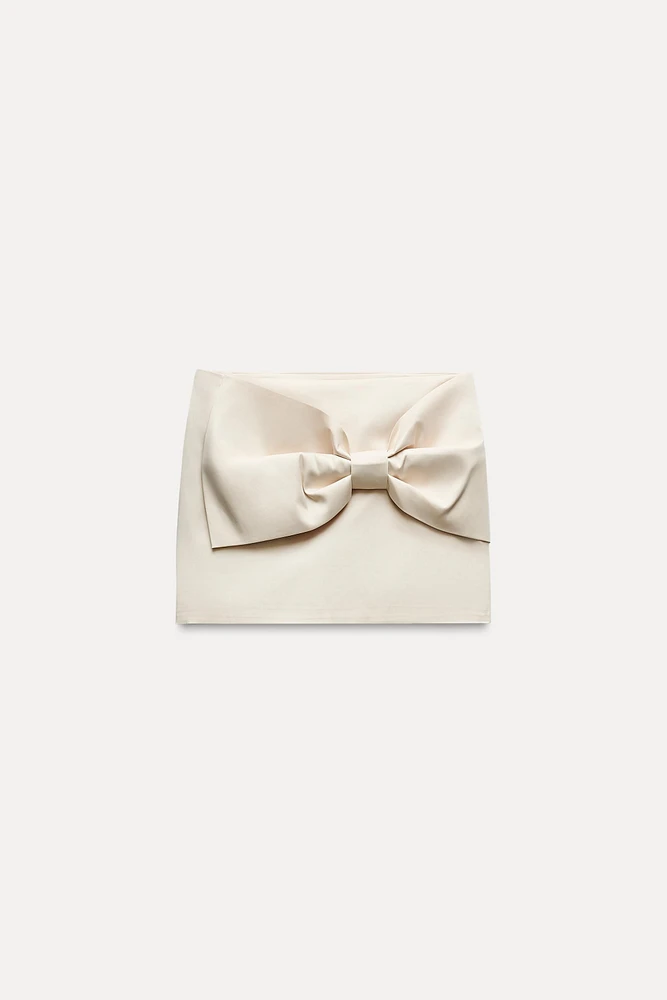 SATIN EFFECT BOW MINI SKIRT