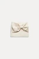 SATIN EFFECT BOW MINI SKIRT