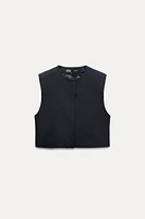 SHORT VEST WITH SHOULDER PADS