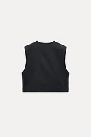 SHORT VEST WITH SHOULDER PADS