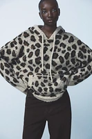 ANIMAL PRINT JACQUARD KNIT SWEATSHIRT