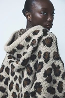 ANIMAL PRINT JACQUARD KNIT SWEATSHIRT