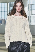 CABLE KNIT SWEATER WITH SIDE STRAPS