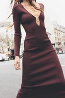 KNIT DRESS WITH GOLDEN APPLIQUÉ