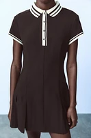 BOX PLEAT DRESS WITH CONTRASTING RIB TRIM