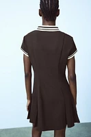 BOX PLEAT DRESS WITH CONTRASTING RIB TRIM