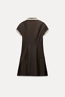 BOX PLEAT DRESS WITH CONTRASTING RIB TRIM