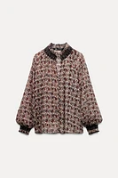 SMOCKED PRINTED BLOUSE