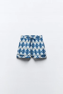 PRINTED SHORTS WITH PIPING