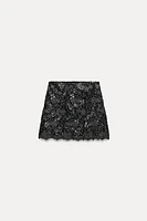 SEQUIN KNIT MINI SKIRT