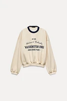 VARSITY SWEATSHIRT