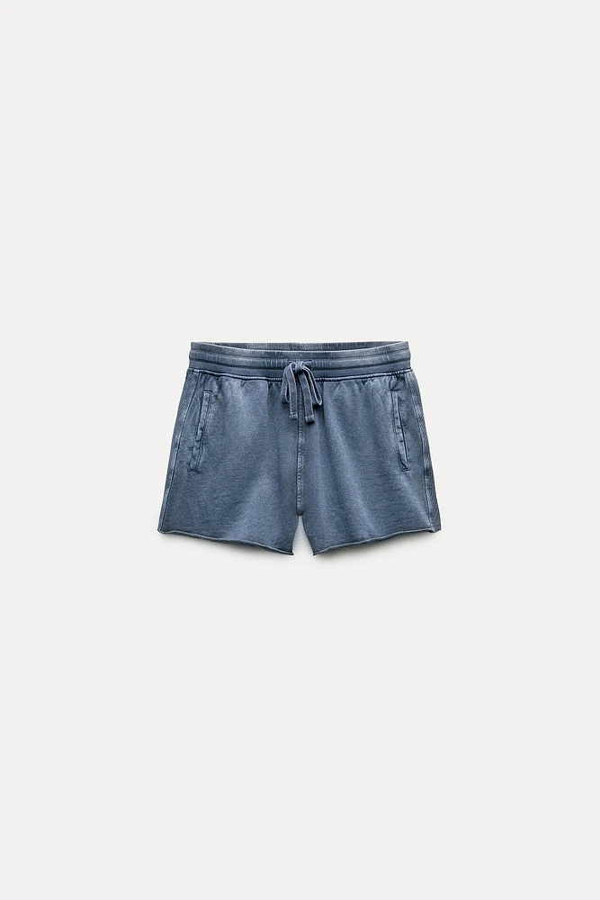 WASHED EFFECT PLUSH SHORTS