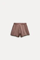 WASHED EFFECT PLUSH SHORTS