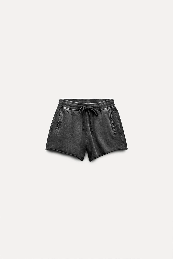 WASHED EFFECT PLUSH SHORTS